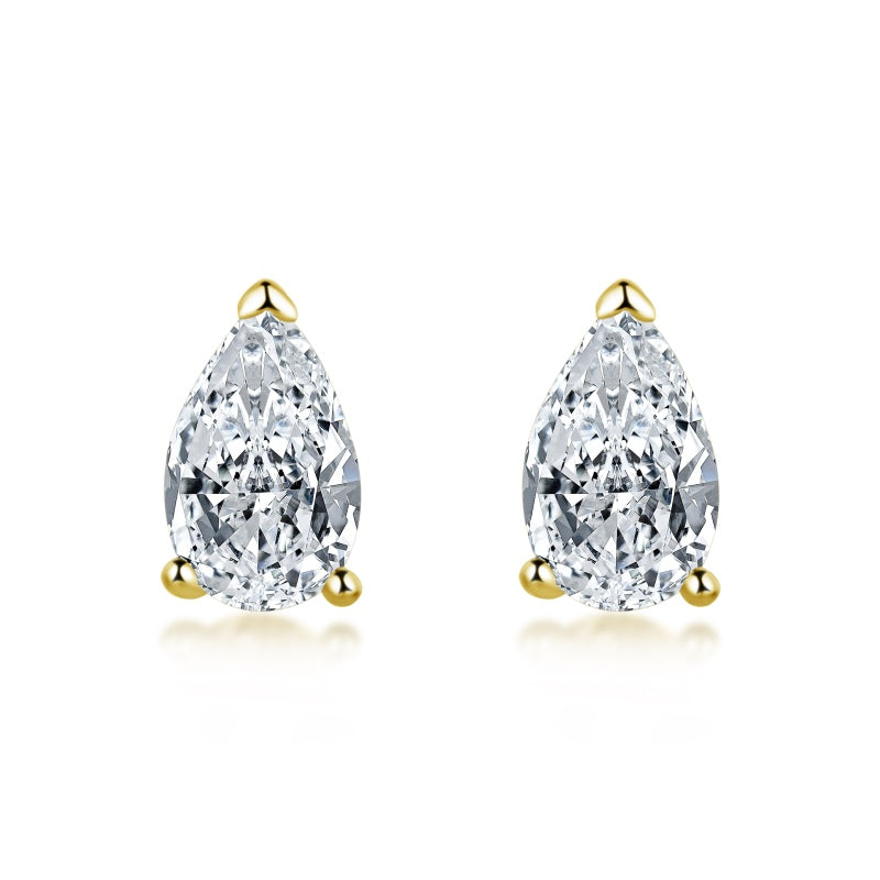 pear cut stud earrings in gold on white background
