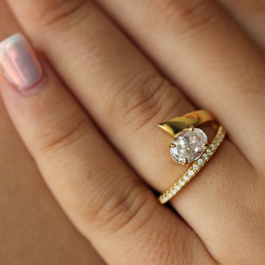 Gold oval cut wrap ring 1ct worn on model