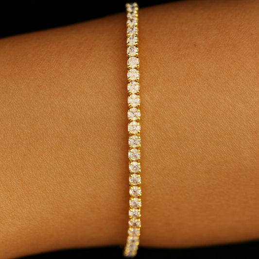 Gold 3mm tennis bracelet on wrist