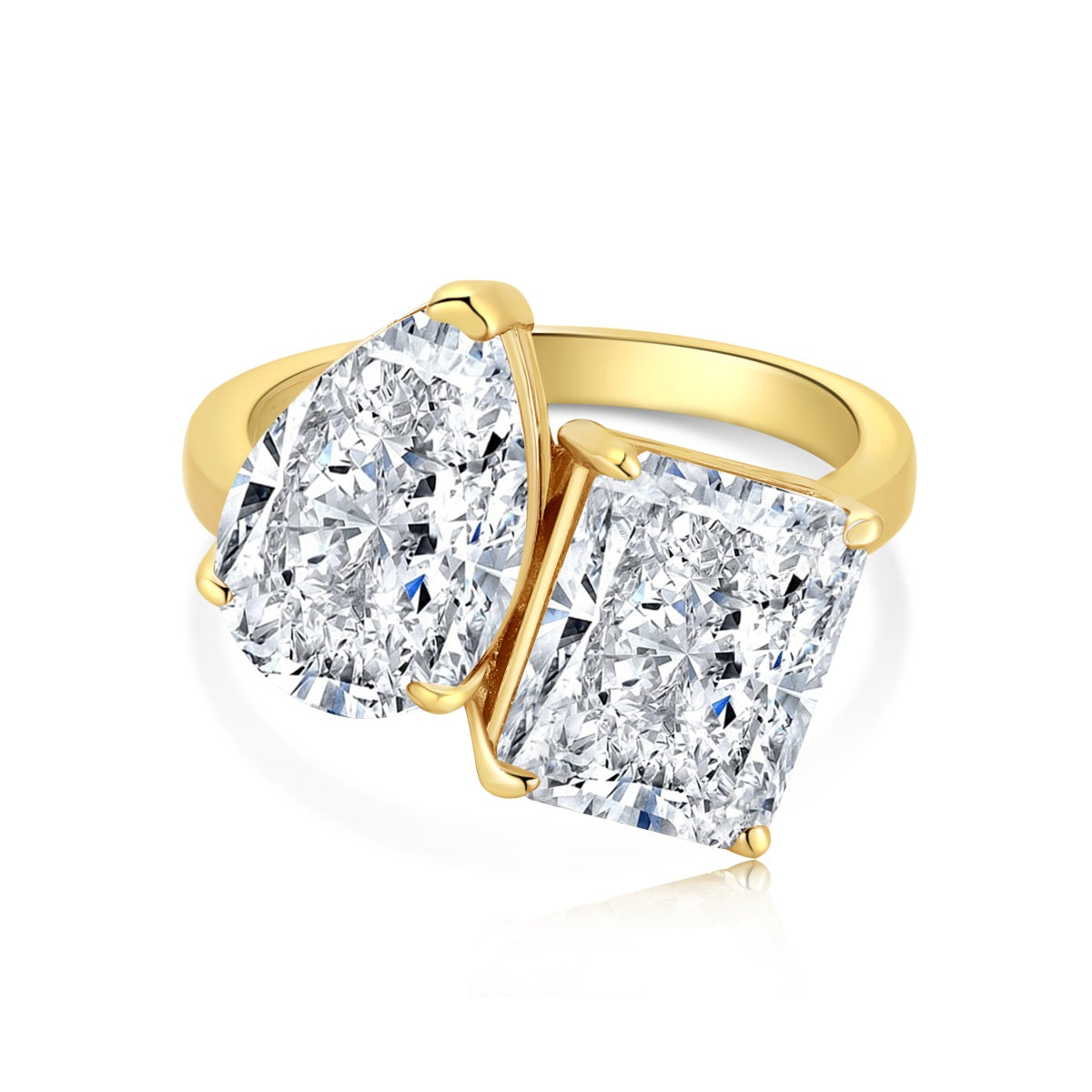 gold toil et moi ring with pear and rectangle stones
