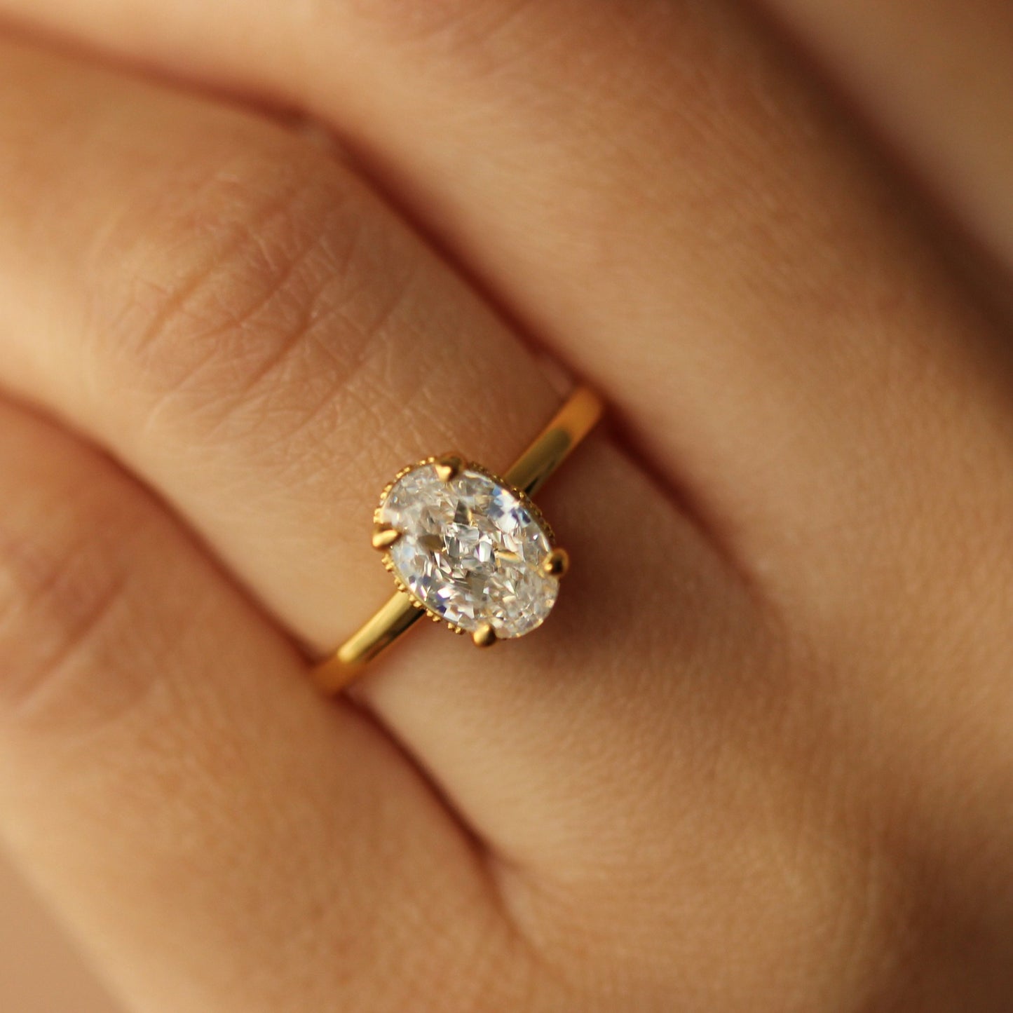 Oval cubic zirconia ring on hand