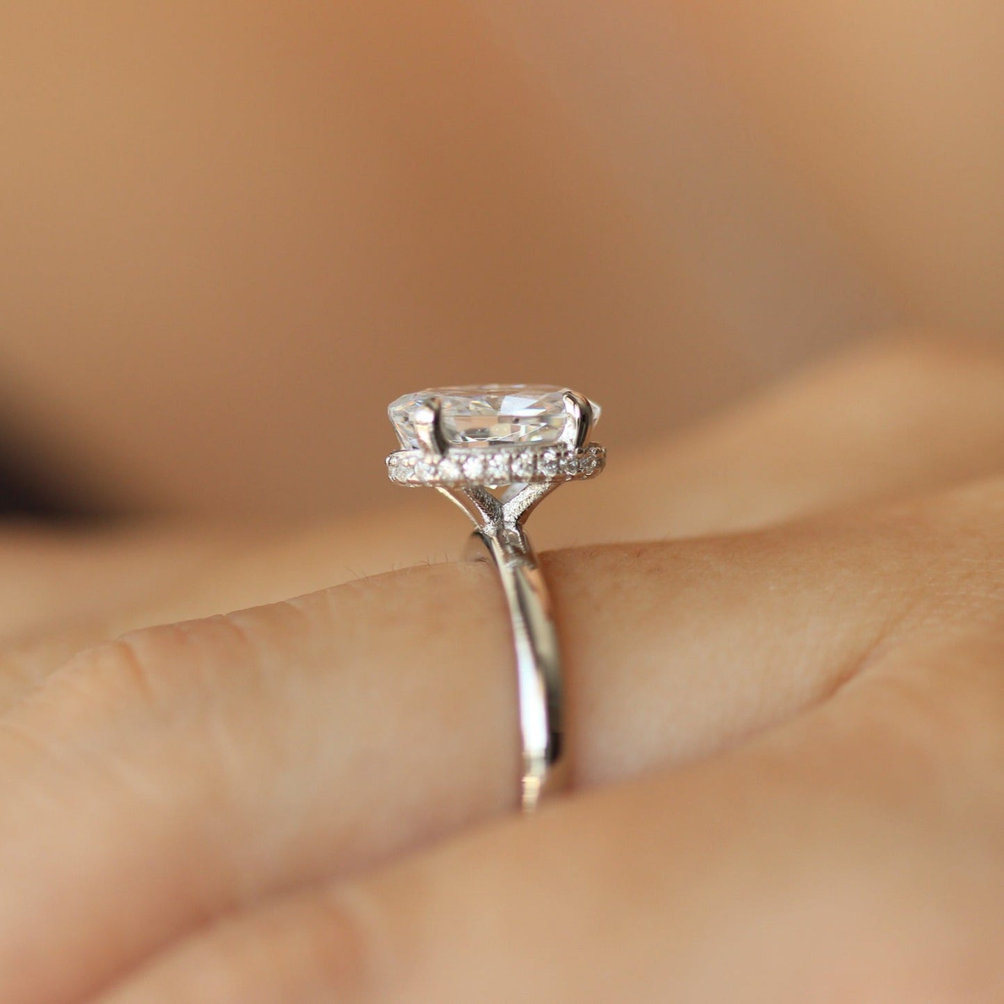 Silver oval ring on hand