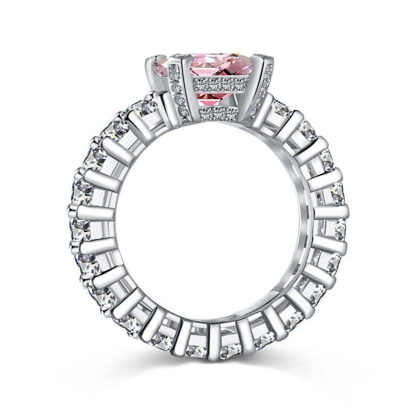 pink emerald ring with baguette side stones