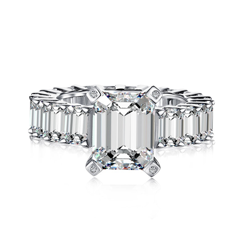 silver emerald ring with baguette side stones