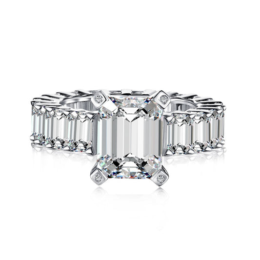 silver emerald ring with baguette side stones