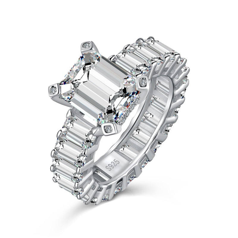 silver emerald ring with baguette side stones