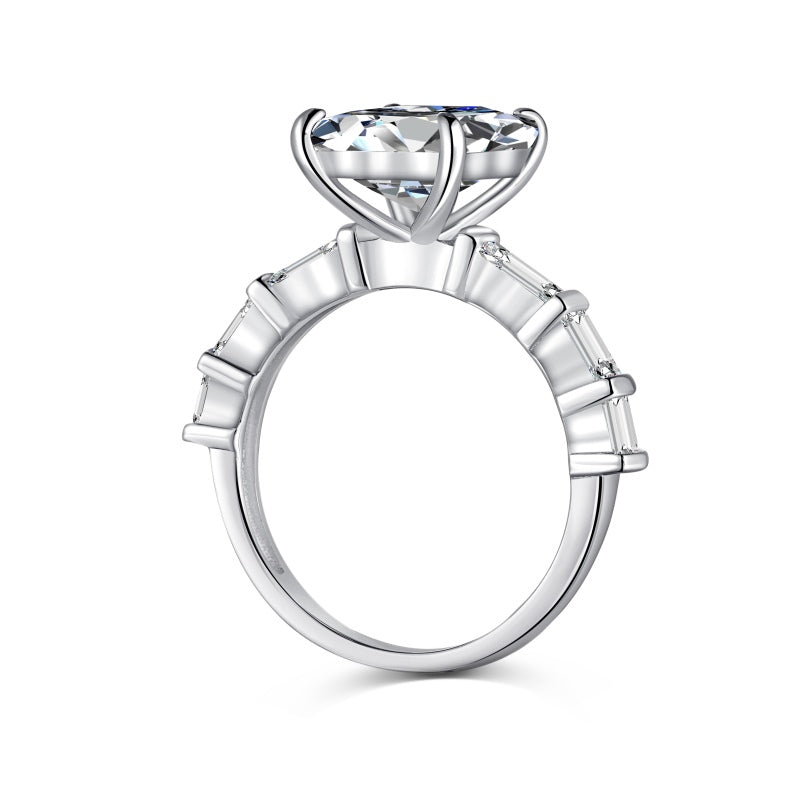 miami emerald ring with baguette side stones on white background side profile