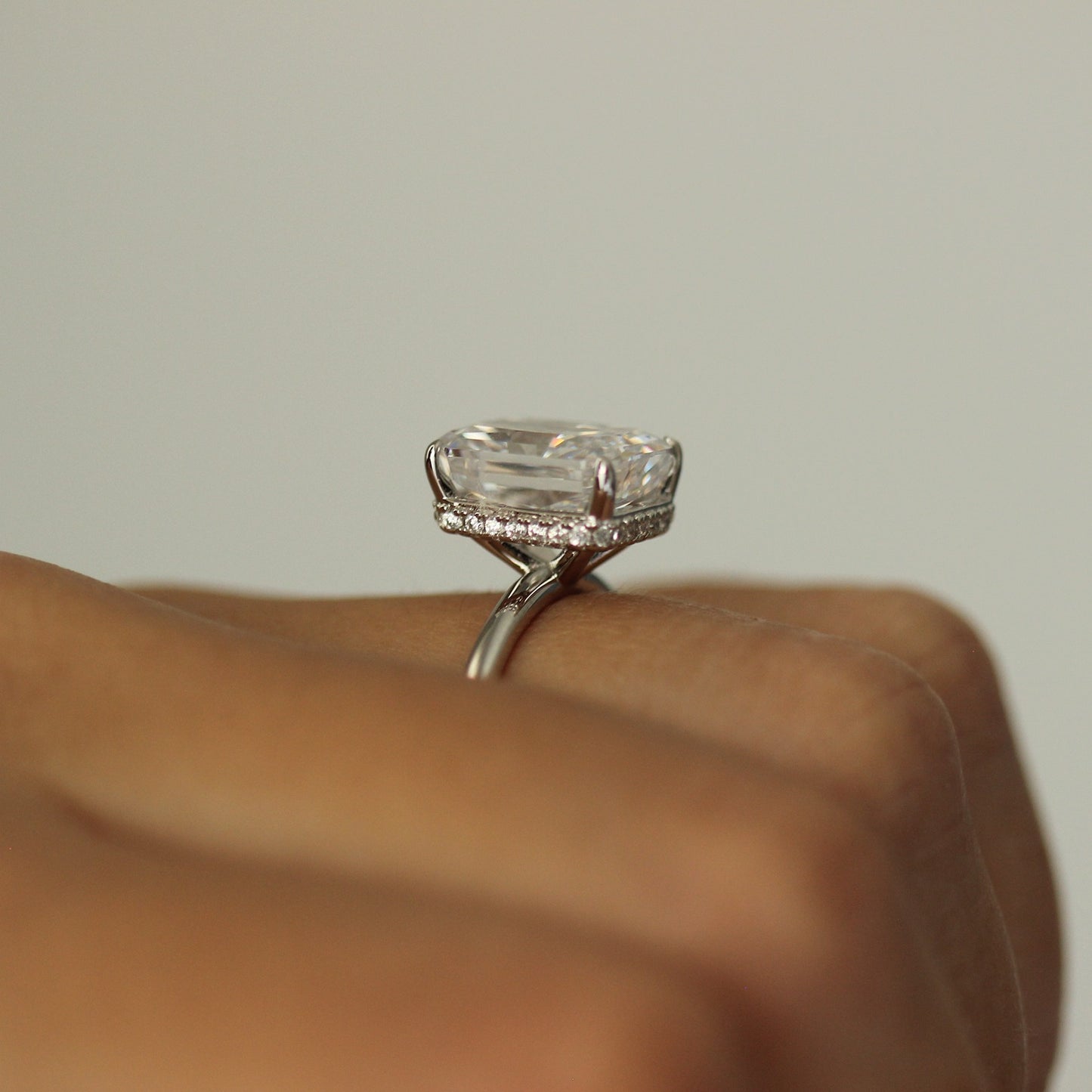 silver radiant ring side profile on hand