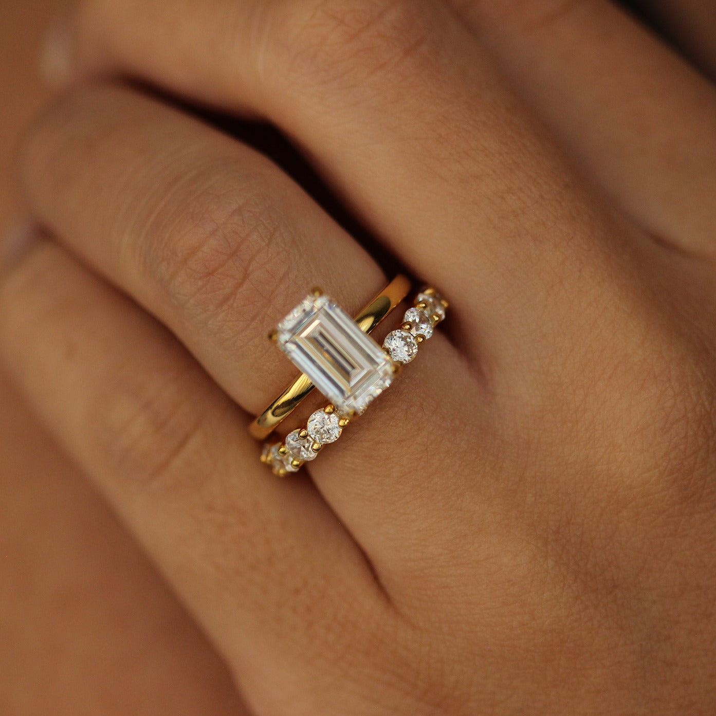 plain emerald gold vermeil ring on hand with stacking ring