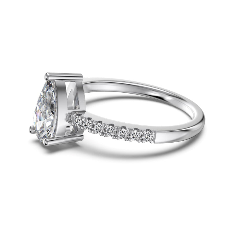 pear ring in silver on half pave band with a slim centre stone