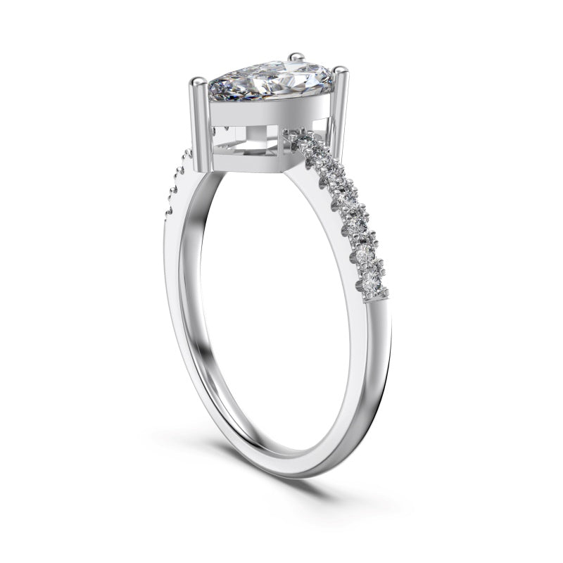 pear ring in silver on half pave band with a slim centre stone