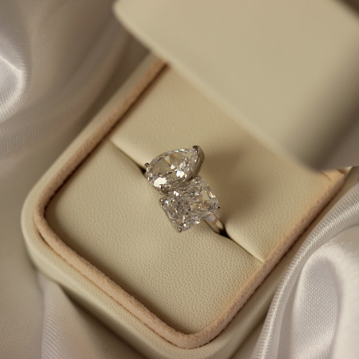 pear and radiant cut toi et moi dupe engagement ring