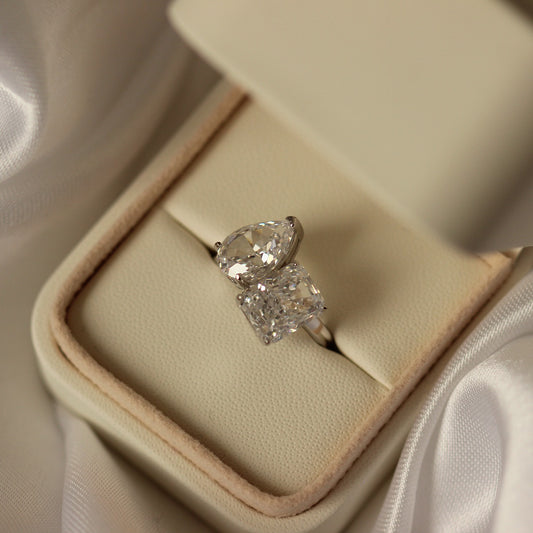 pear and radiant cut toi et moi dupe engagement ring