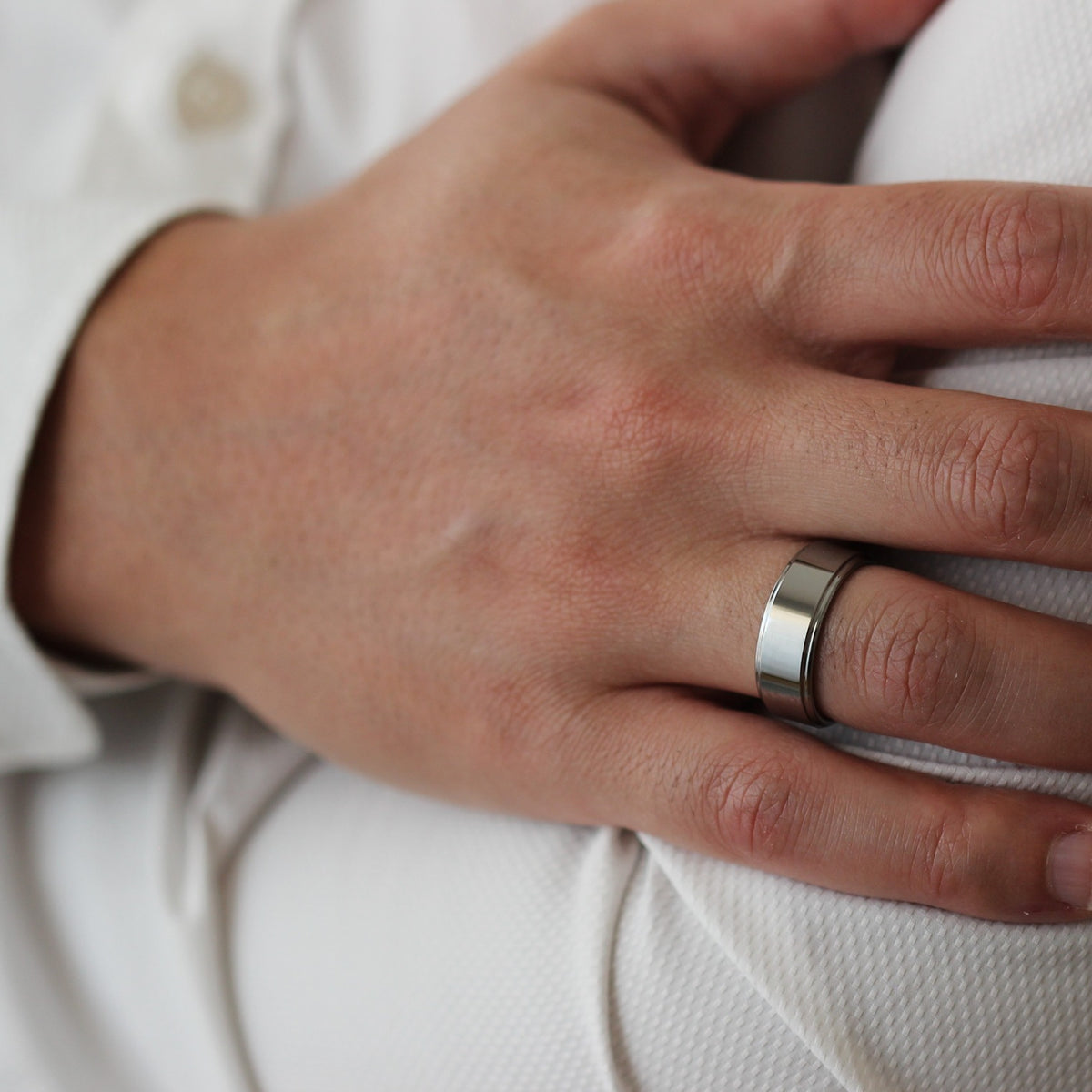 polished silver mens ring with stepped edges