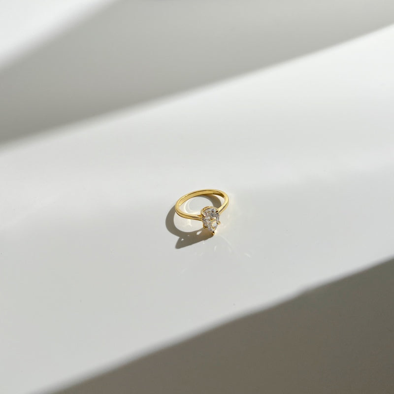 gold pear ring 5 prong setting