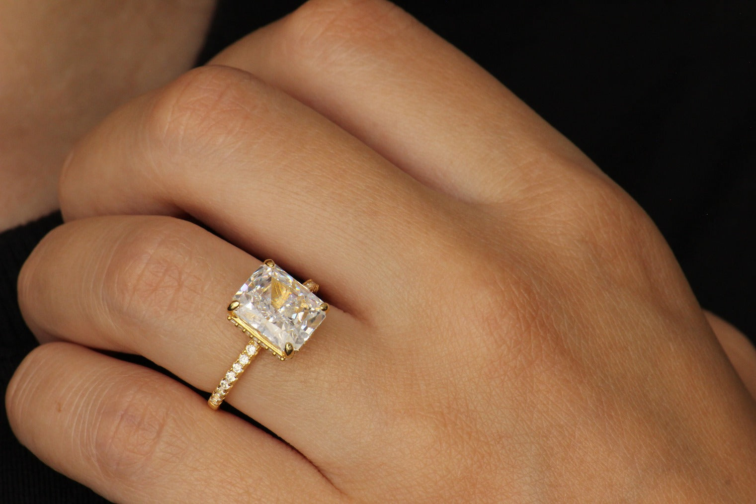 radiant cut gold ring with cz stones on band