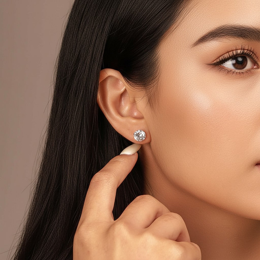 round cut cubic zirconia stud earrings in silver