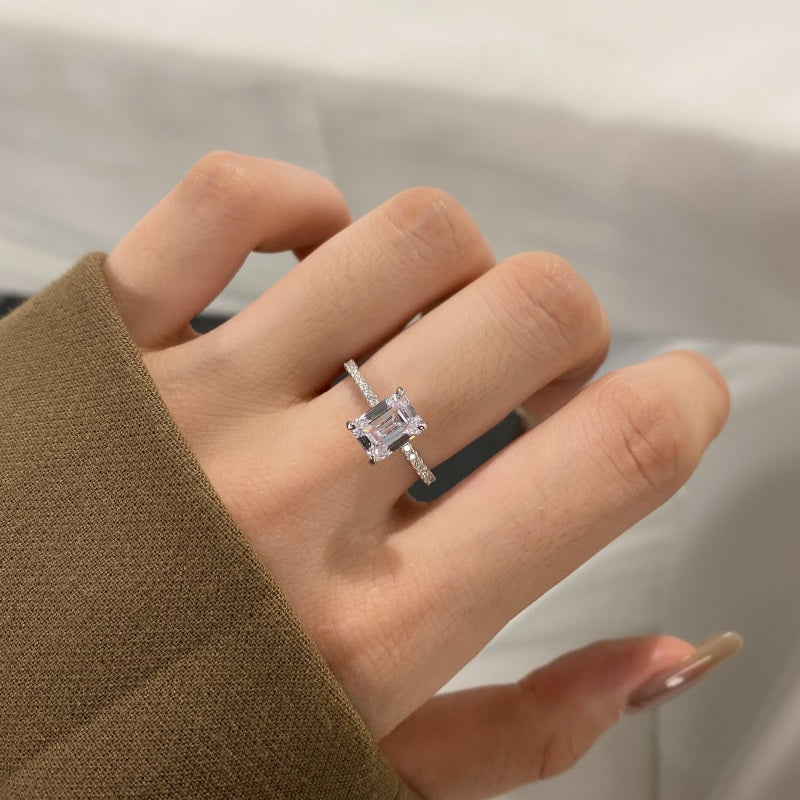 seoul emerald cut ring on womens hand