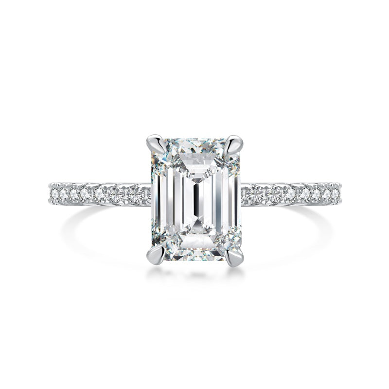 seoul emerald moissanite ring on half pave band