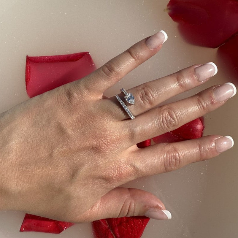 silver ring with pear stone tilted sideways