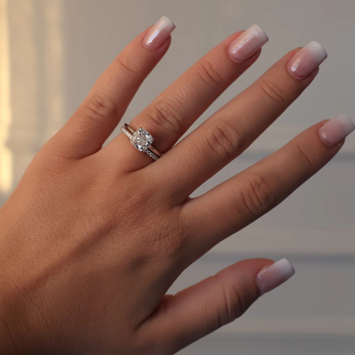 Silver 2 carat cushion moissanite engagement ring in solitaire