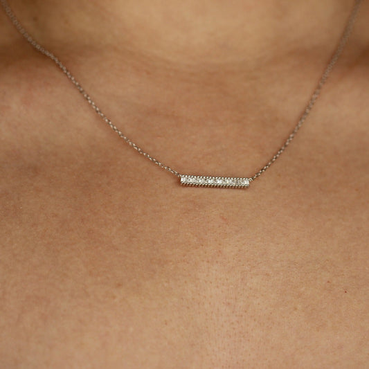 silver bar necklace on model