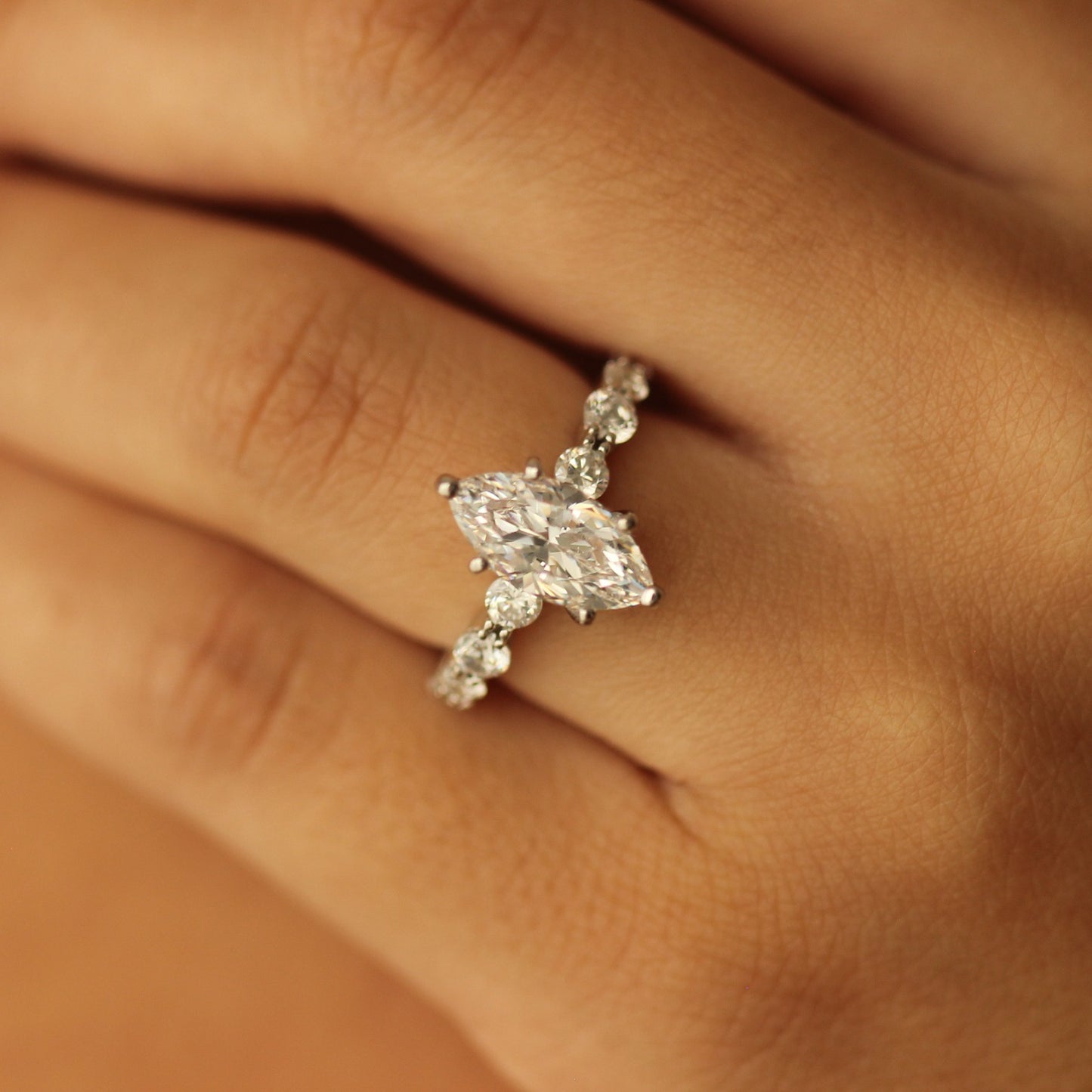 silver marquise cubic zirconia ring with floating band on hand
