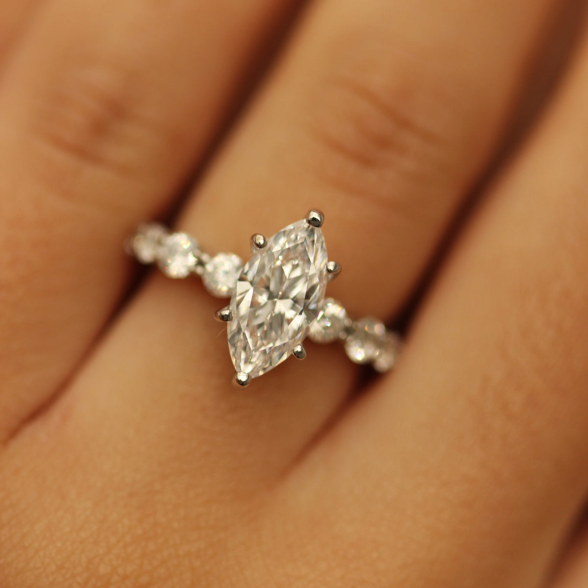 silver marquise cubic zirconia ring with floating band on hand