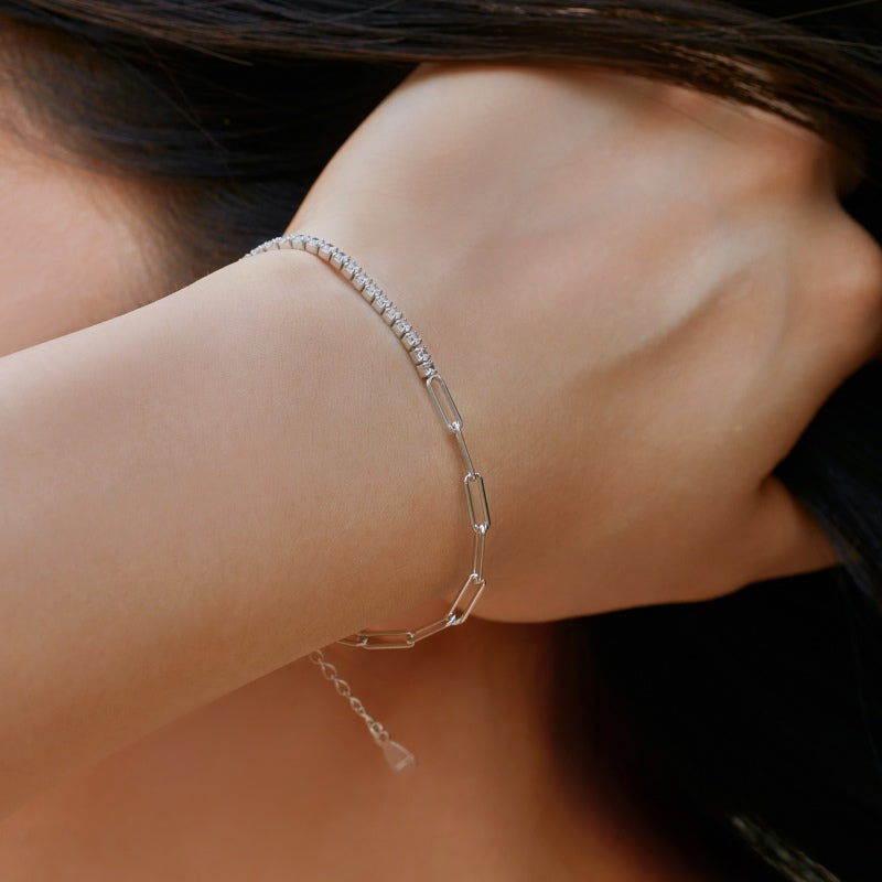 girl wearing Silver Tennis Chain Bracelet running her hands through her hair