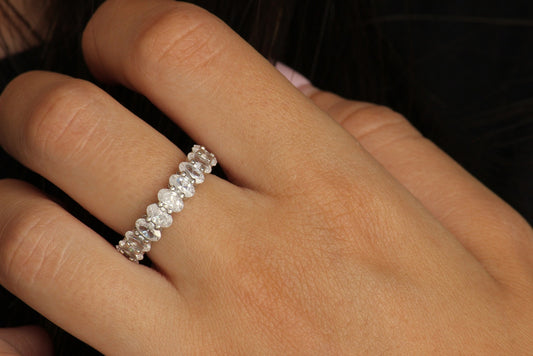 oval eternity ring featuring multiple stones around the band