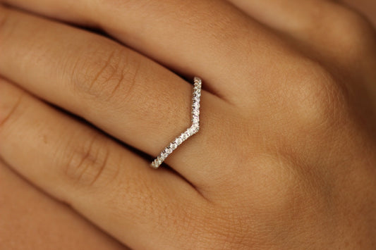 silver wishbone ring on hand