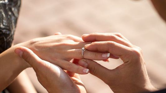 person proposing with fake engagement ring