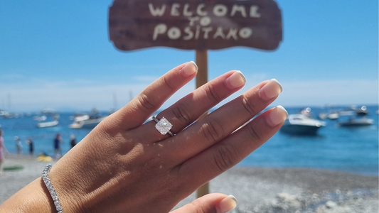 travel jewels on engagement ring finger in positano