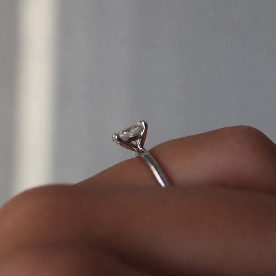 1 carat oval cut cubic zirconia solitaire ring with a silver band