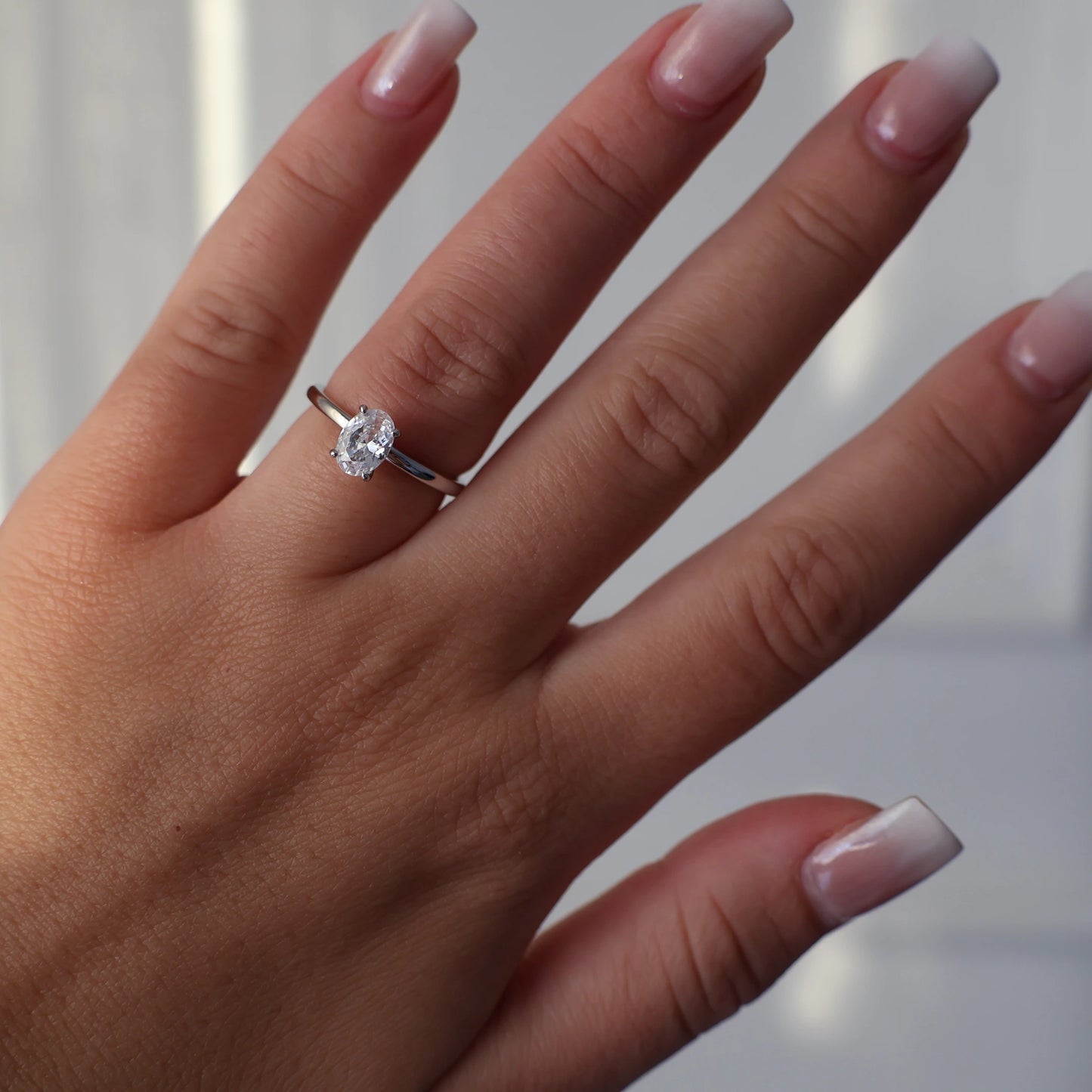 Silver ring with a 1 carat oval cut cubic zirconia solitaire setting