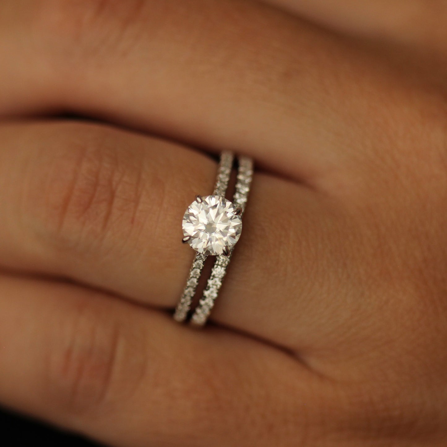 1 carat pavé set moissanite ring stacked with a half pavé band