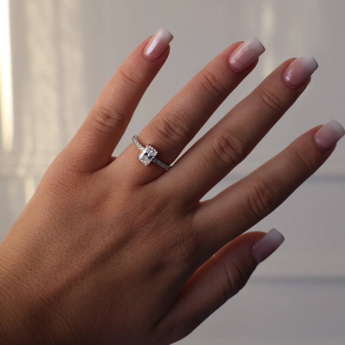 1 carat radiant moissanite silver ring with pavé band