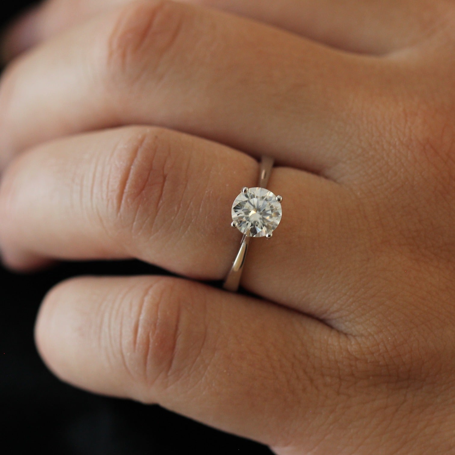 1 carat round moissanite solitaire ring