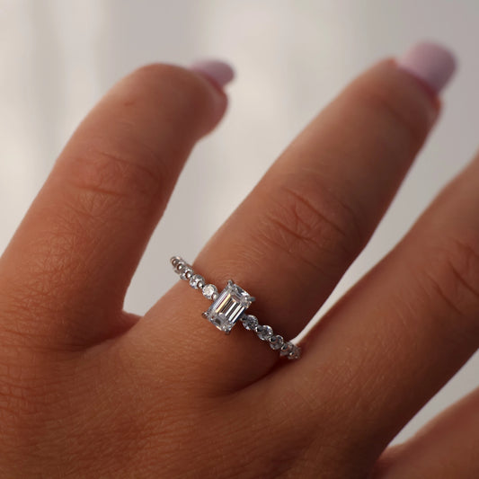 Pear cut 1 carat cubic zirconia halo ring with silver setting