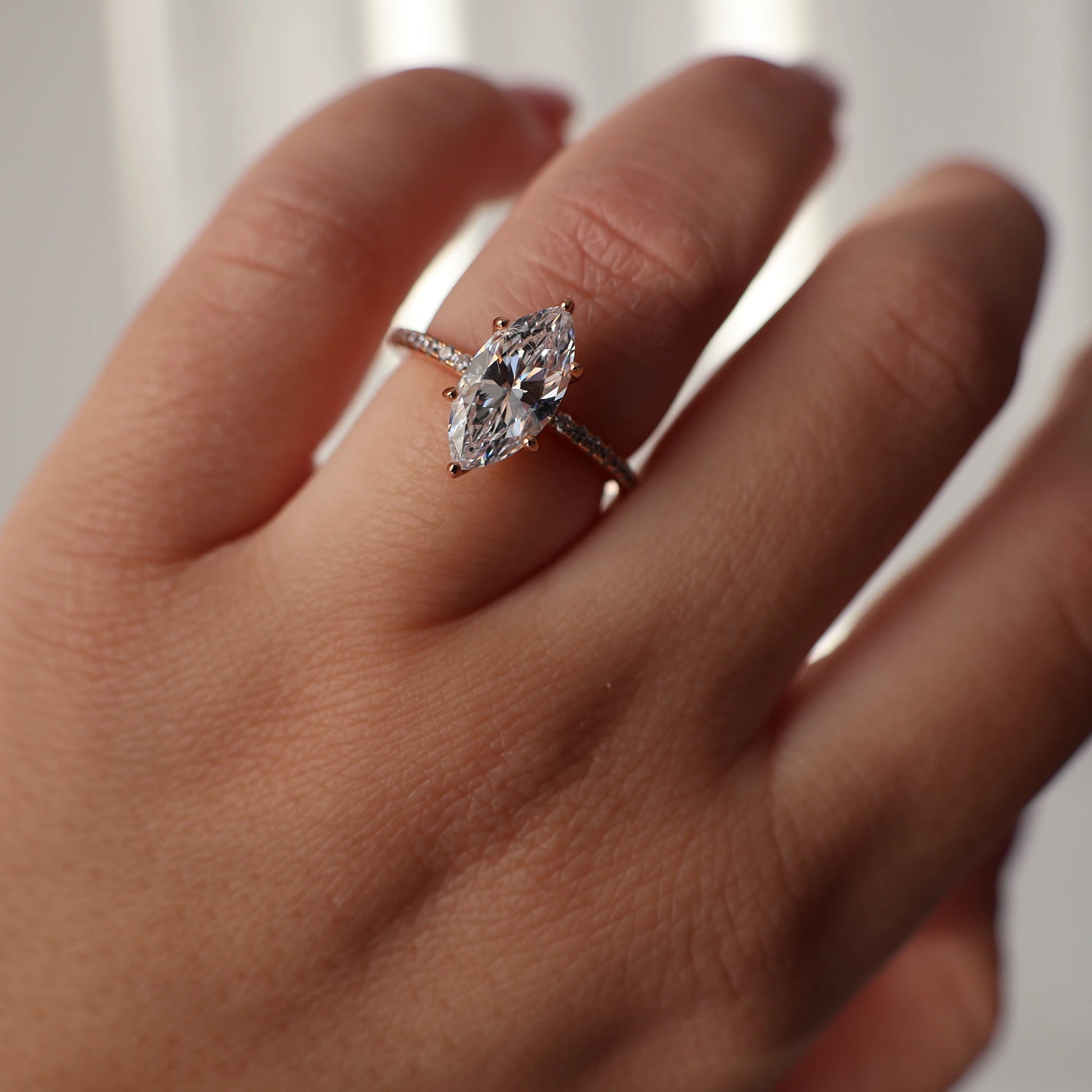 1.5 carat marquise cut champagne gold ring on pave band