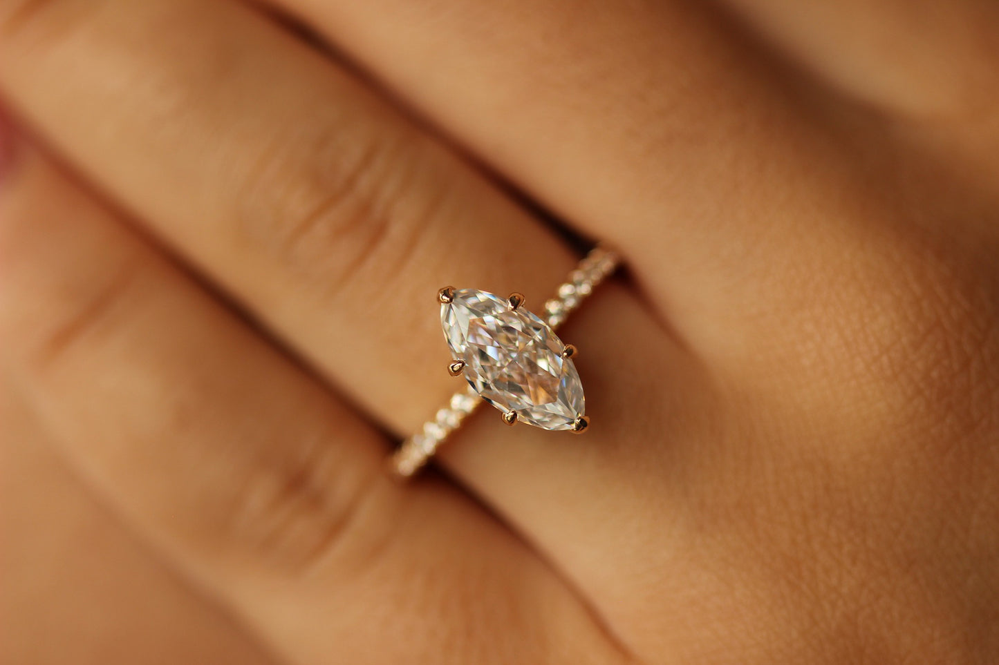 1.5 carat marquise engagement ring in champagne gold