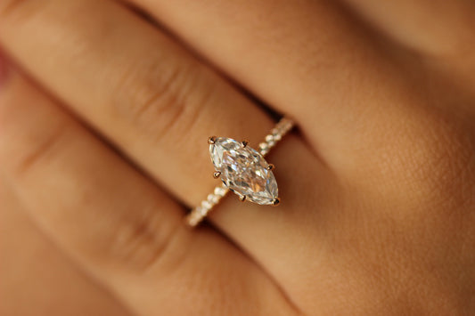 1.5 carat marquise engagement ring in champagne gold