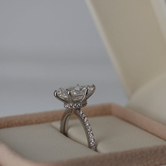 1.5 carat marquise cut cubic zirconia ring with a hidden halo and pavé band in silver