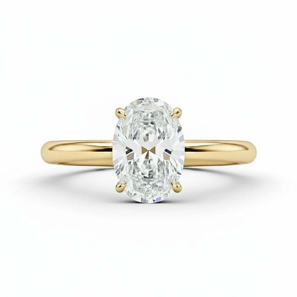 2 carat oval solitaire moissanite ring in 14K gold filled setting on white background