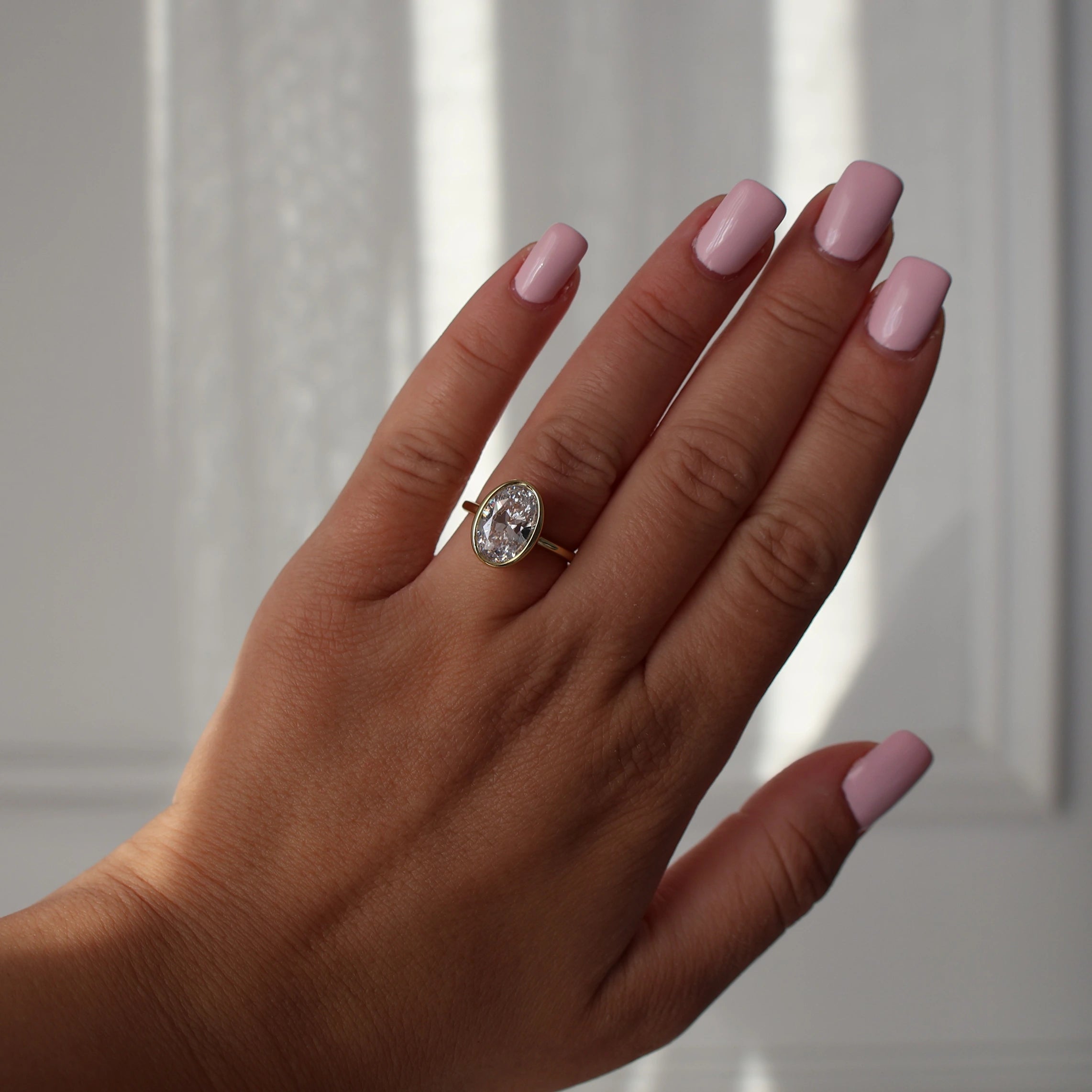 14K gold plated 3.5 carat oval cut bezel set ring