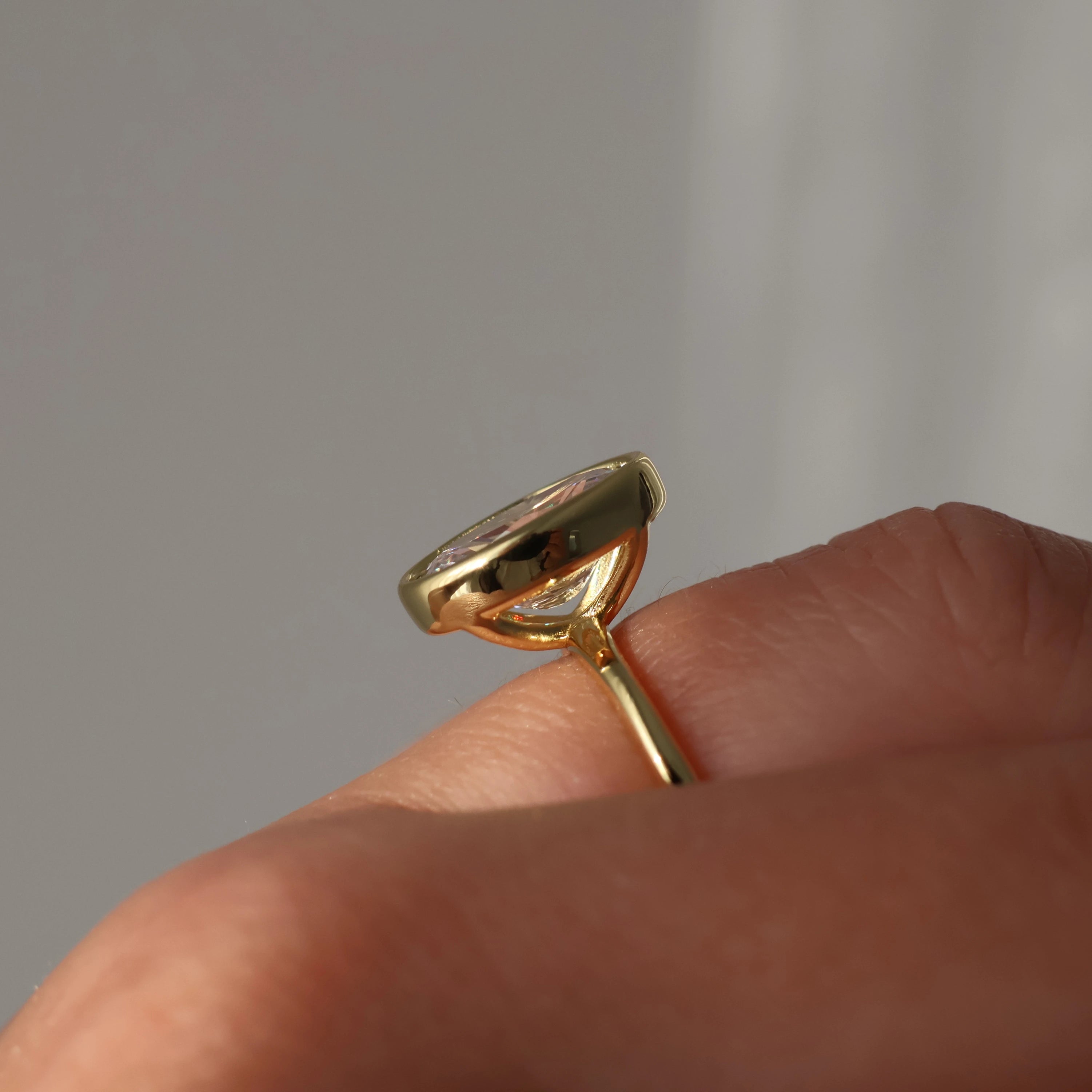 14K gold plated 3.5 ct oval bezel set solitaire ring