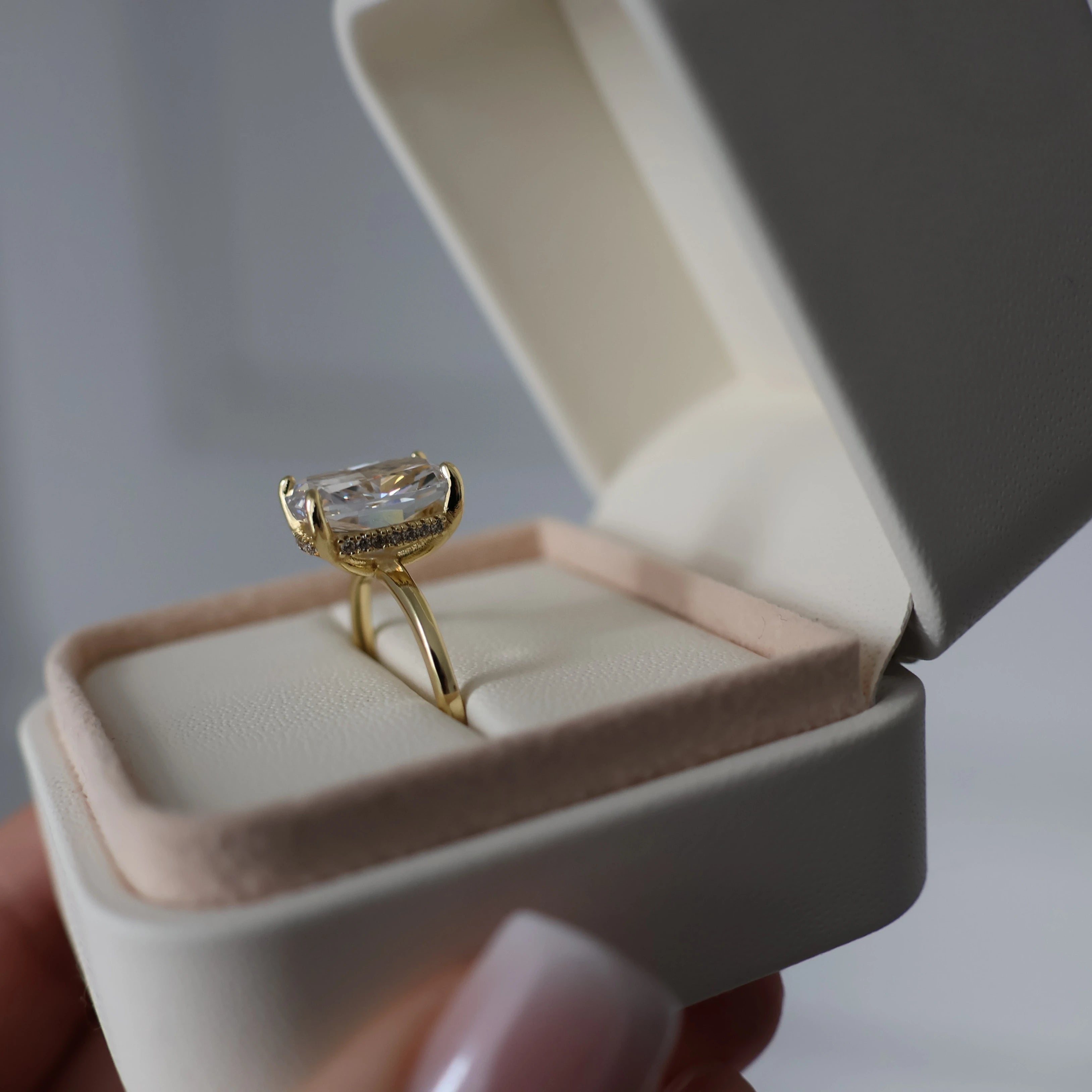 14K gold plated cubic zirconia engagement ring with a 3.5 carat elongated cushion cut stone