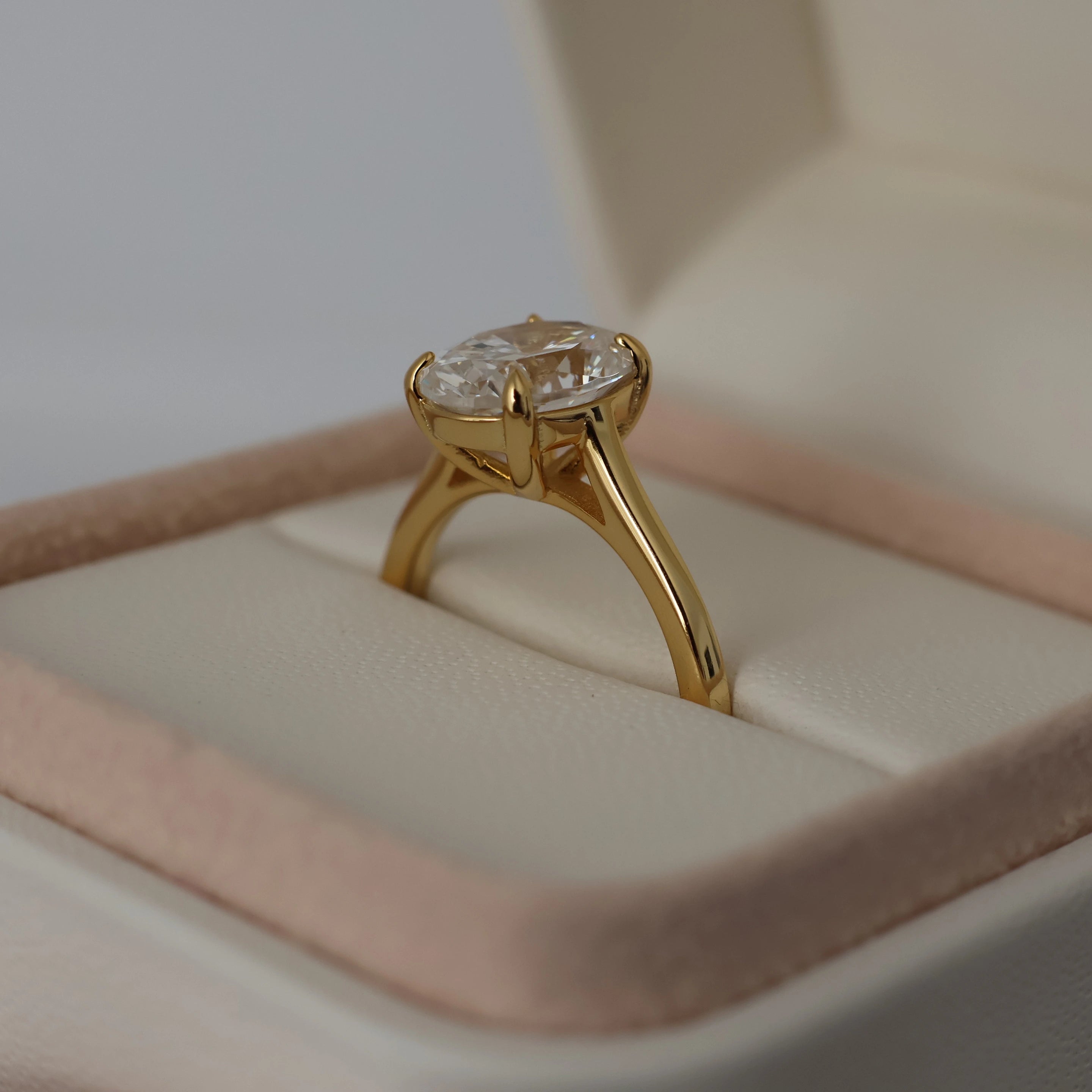 3 ct oval cut cubic zirconia ring in a proposal ring box
