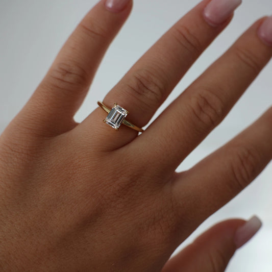 1 carat emerald cut gold cubic zirconia solitaire ring