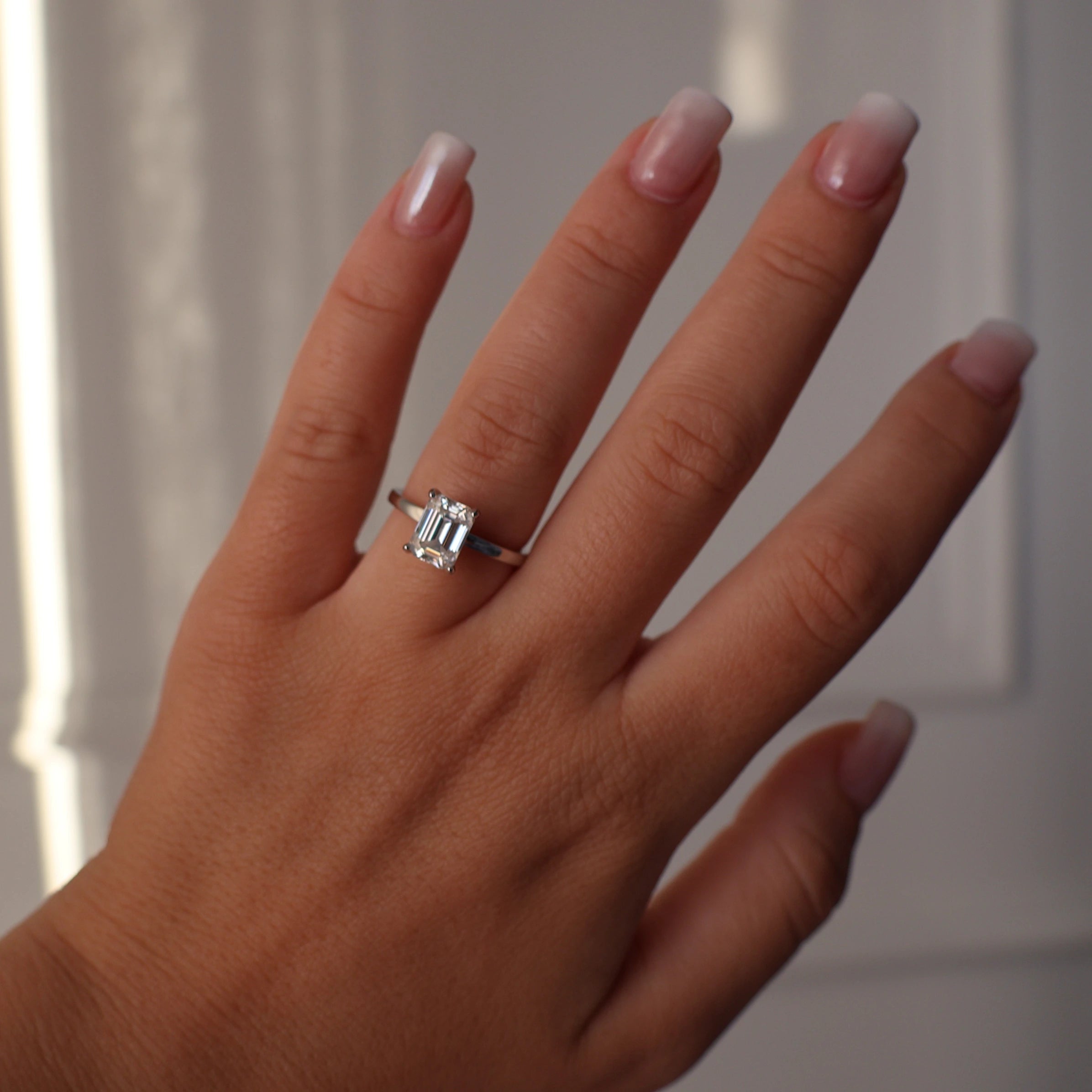 2 carat emerald cut moissanite silver engagement ring